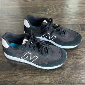 New Balance Women’s Black and White Sneakers size 9
